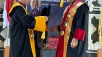 Guru besar UPMI